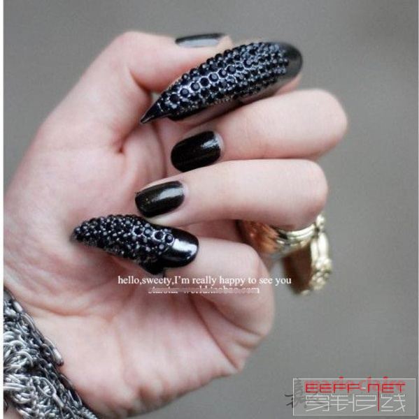 2011-Hot-Wholesale-Cat-Woman-Long-Claw-Ring-Full-Solid-rhinestone-Nail-Ring-2-co.jpg